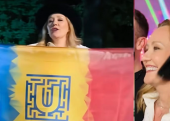Frumoasa Elena Lasconi, care va fi președinta României când va fi și Esca, riscă să ia amendă pentru că a afișat un drapel pe care era pusă siglă Untold
